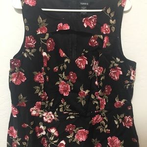 Plus size 2 (2X) Torrid Peek a boo peplum top.